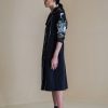 Black germ coat dress